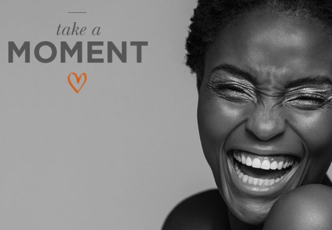 Black and white image of a smiling woman