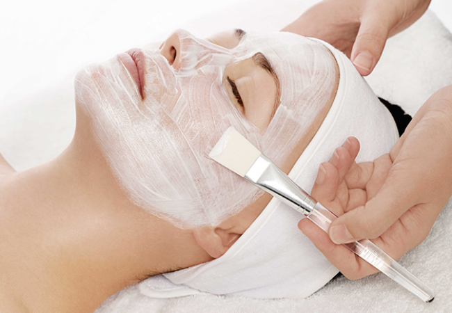 woman getting facial treatment