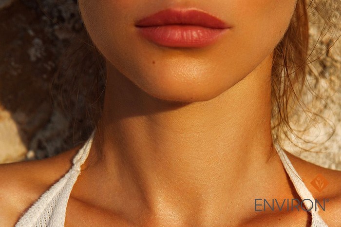 sun kissed mouth and neck of a woman