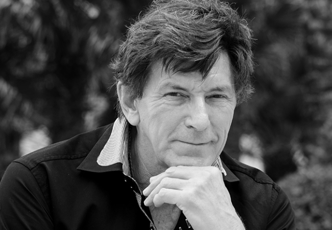 black and white picture of Dr Des Fernandes