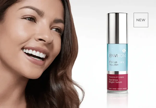 woman with bottle of night serum