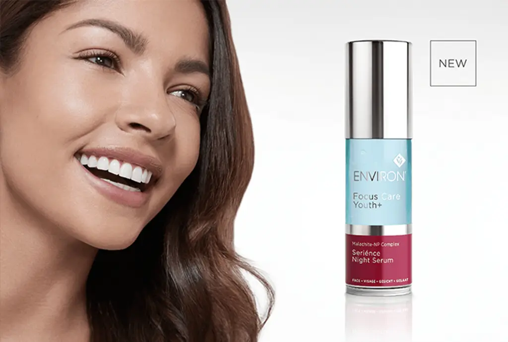 woman with bottle of night serum